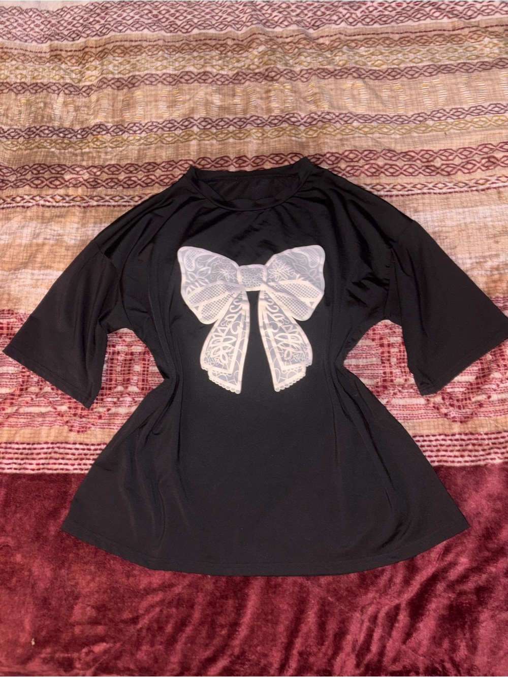 Black Women’s Top with White Bow Graphic